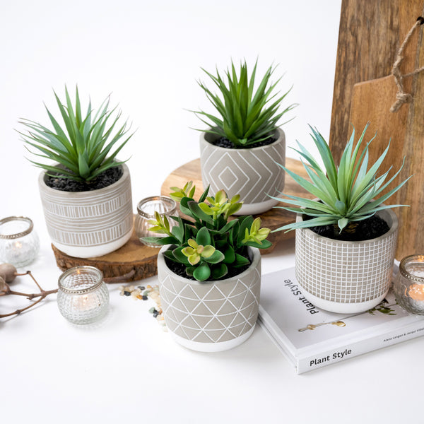 Artificial succulent plant in geometric patterned concrete pot 8