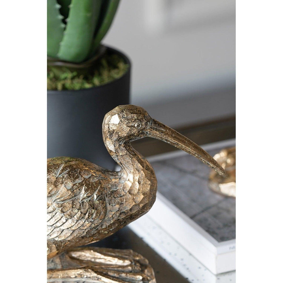 Antique Gold Kneeling Crane Figurine