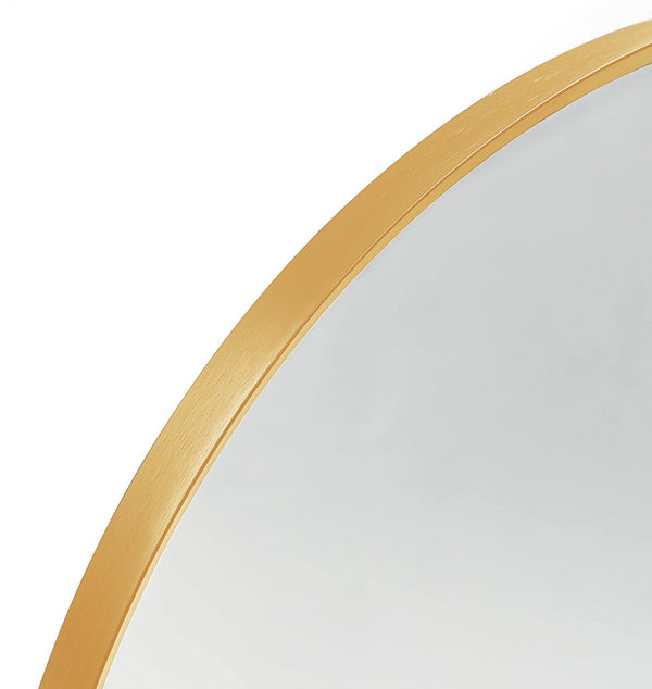 Detail of arched top on 24x36 Inch Gold Metal Framed Mirror showcasing smooth brushed gold finish for a refined decorative touch.