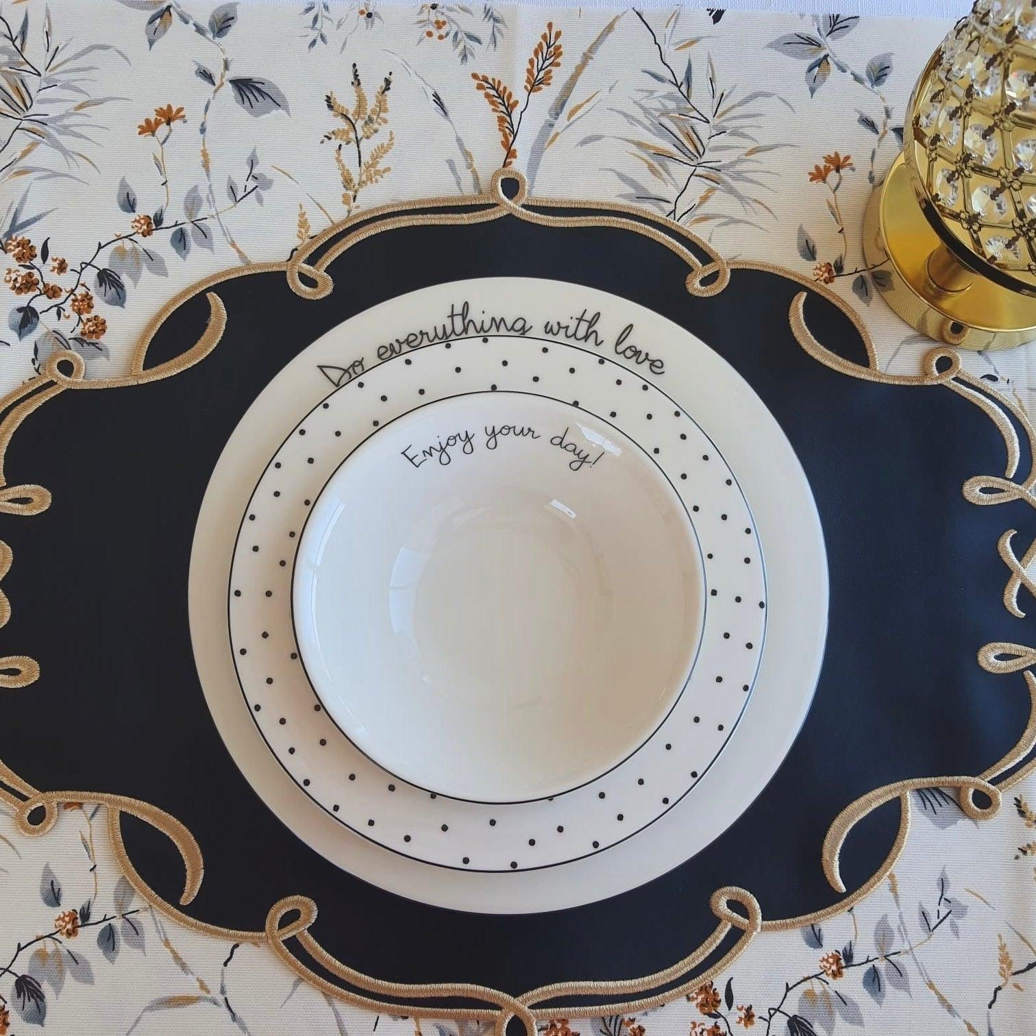 CELESTIA BLACK OVAL FAUX LEATHER PLACEMAT & NAPKIN & COASTER SET