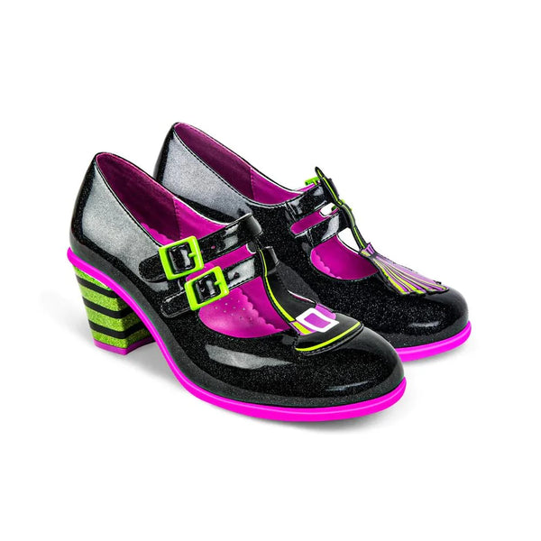 Black shoes with pink soles and green accents on a white background