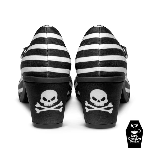 Black and white striped shoes with skull designs on a white background
