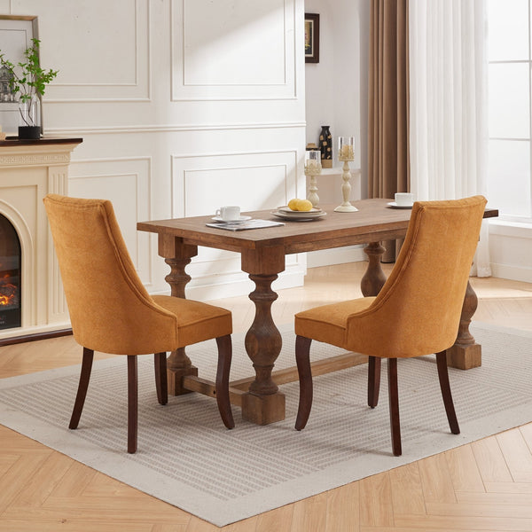 Back view of the Set of 2 Rayon Cloth Flocking Linen Dining Chairs around a wooden dining table in a cozy dining area.