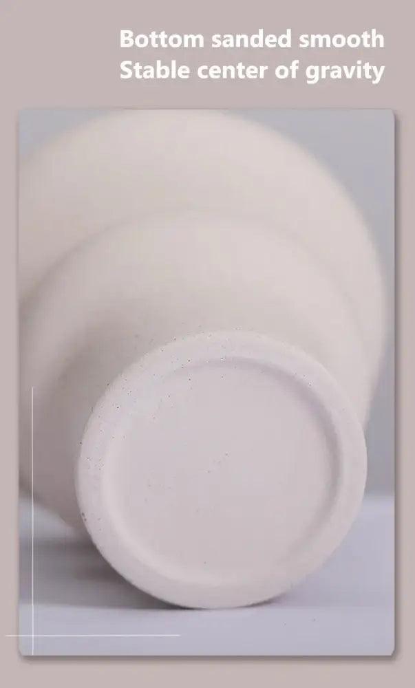 White Sculpted Ceramic Vase