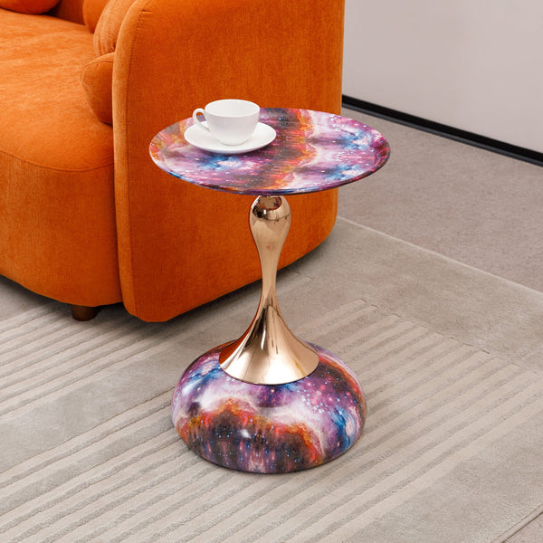 Mermaid Tail End Coffee Table Round Side placed beside orange sofa, featuring galaxy print and gold stem, ideal for modern living spaces.