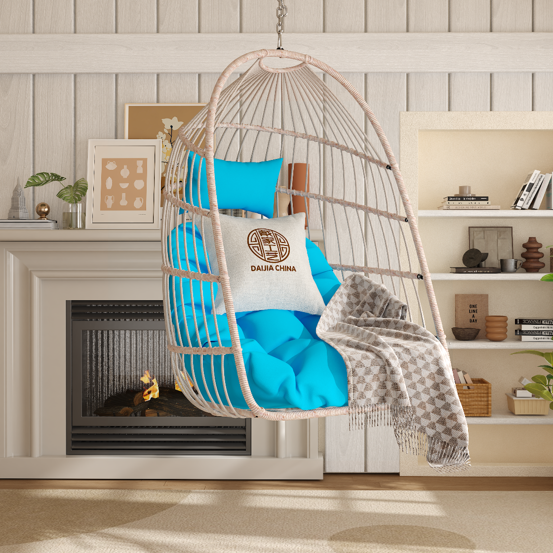 Hanging chair with blue cushions and a blanket in a living room setting.