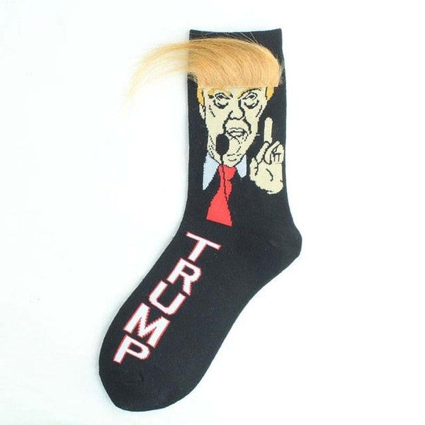 Black sock with a graphic of a person with blonde hair and a red tie, giving a middle finger, on a white background.