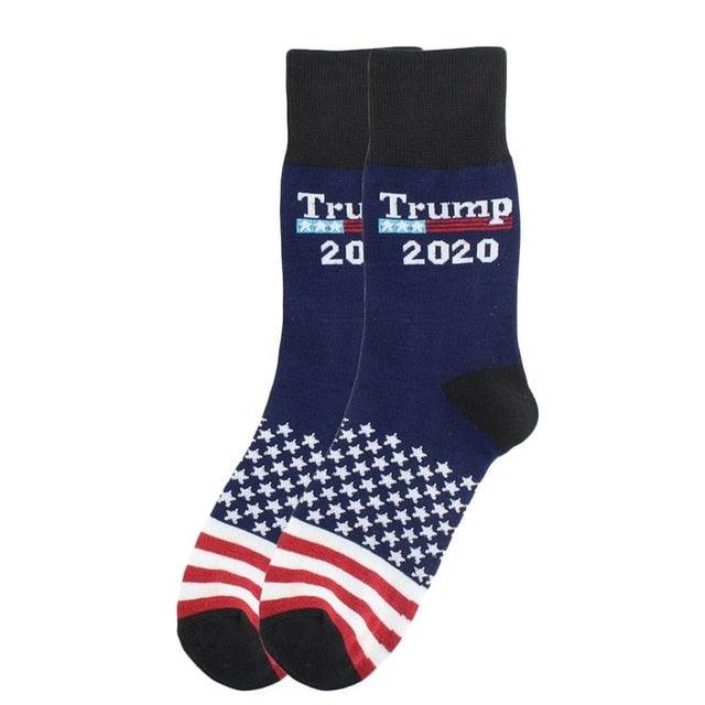 Navy blue socks with American flag design and 'Trump 2020' text on a white background