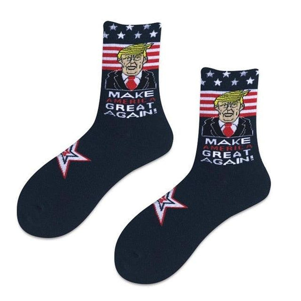 Two socks with a graphic of a person and 'Make America Great Again!' text on a white background.