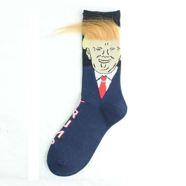 Navy blue sock with a graphic of a smiling face with blonde hair and red tie on a white background