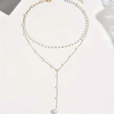 Elegant Vintage Style Double-Layer Pendant Necklace with Imitation Pearl Accents and Tassel Drop