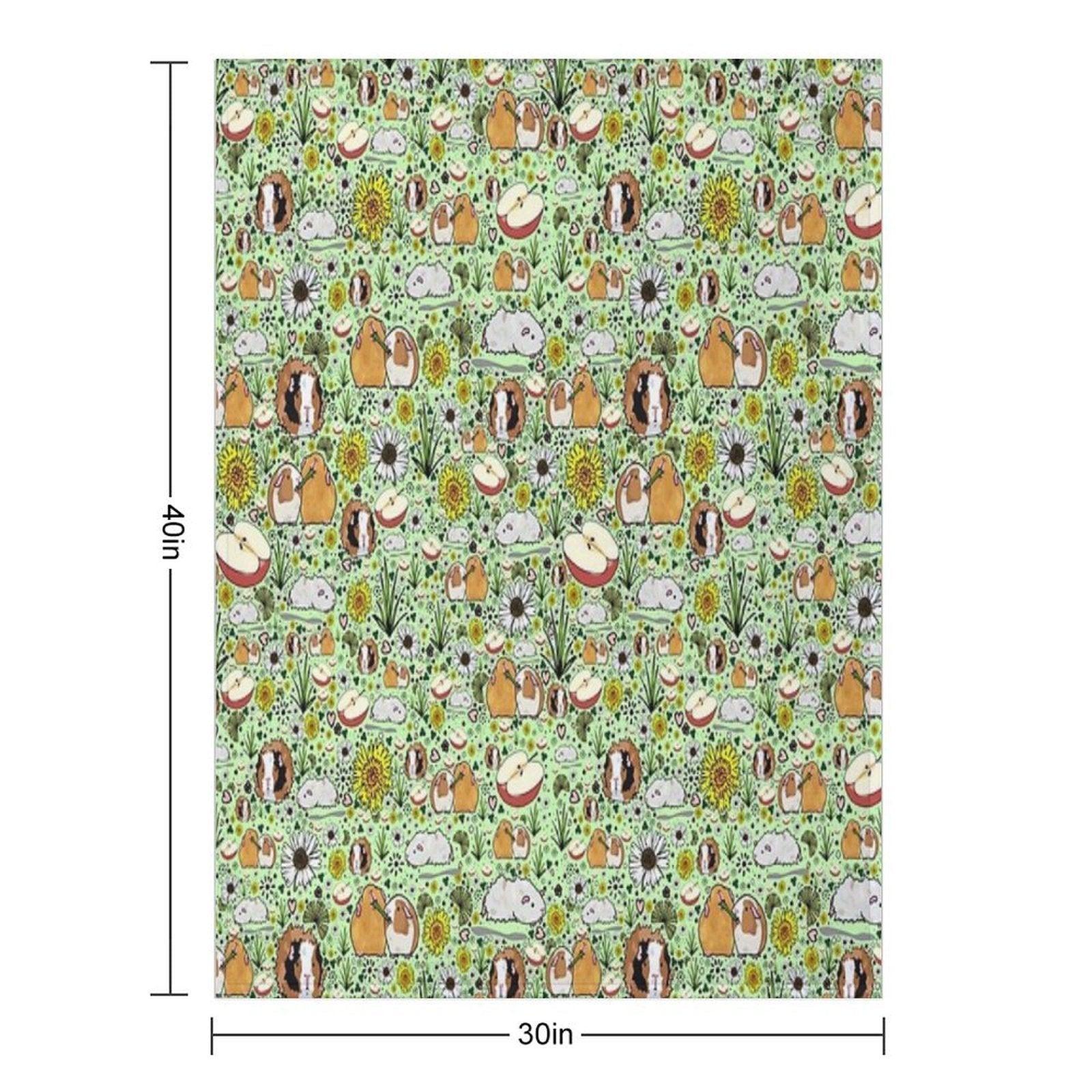 Guinea Pigs in Green Throw Blanket