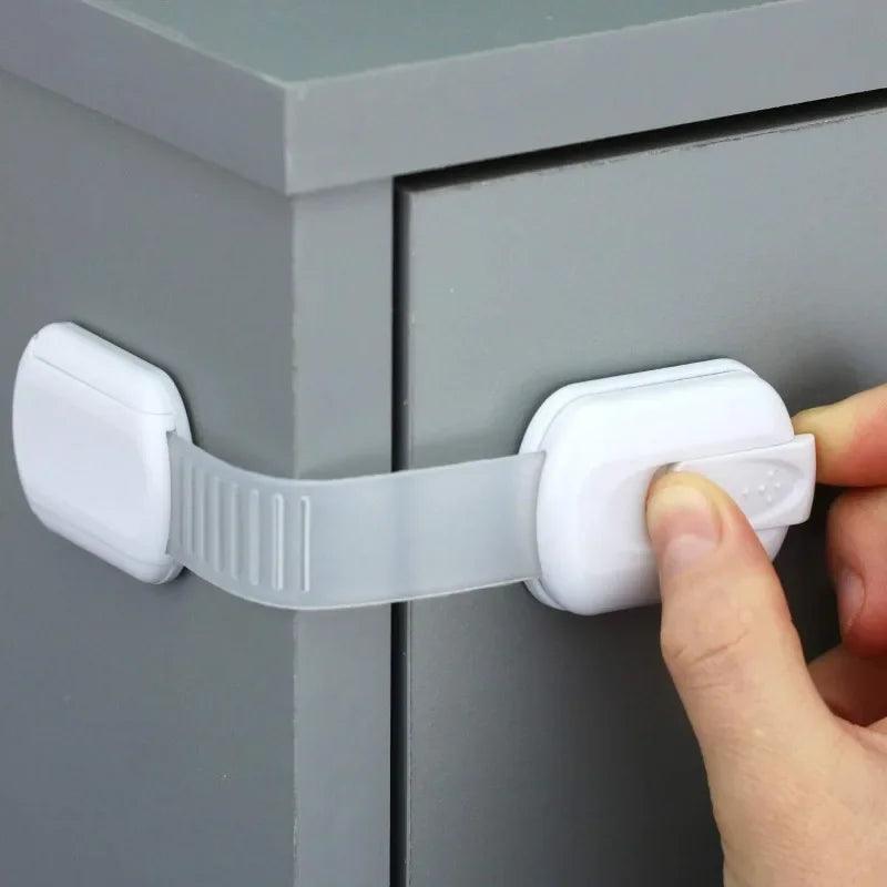 Adjustable Baby & Childproof Cabinet Safety Lock — Adhesive Drawer Latch Strap for Cabinets, Drawers & Appliances