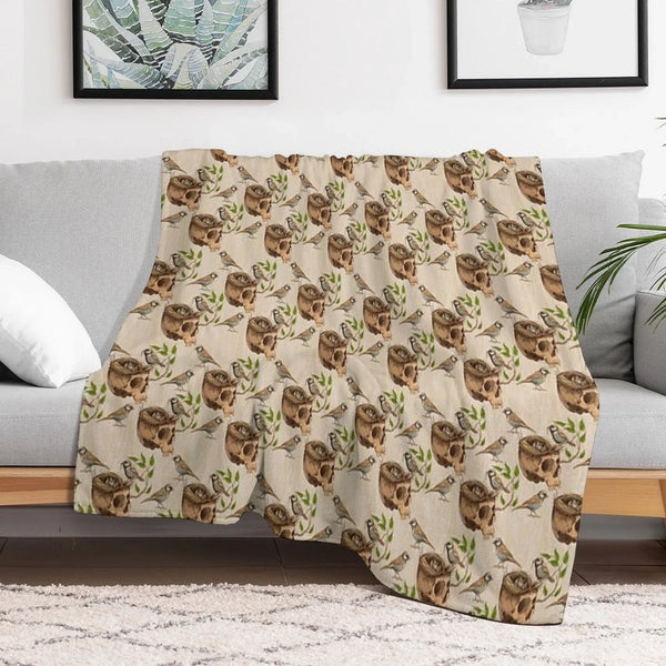Black And White Illustration of Birds Making A Nest in Animal Skull Throw Blanket