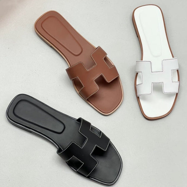 Flat bottomed beach sandals are fashionable casual lightweight and can be worn as a single drag