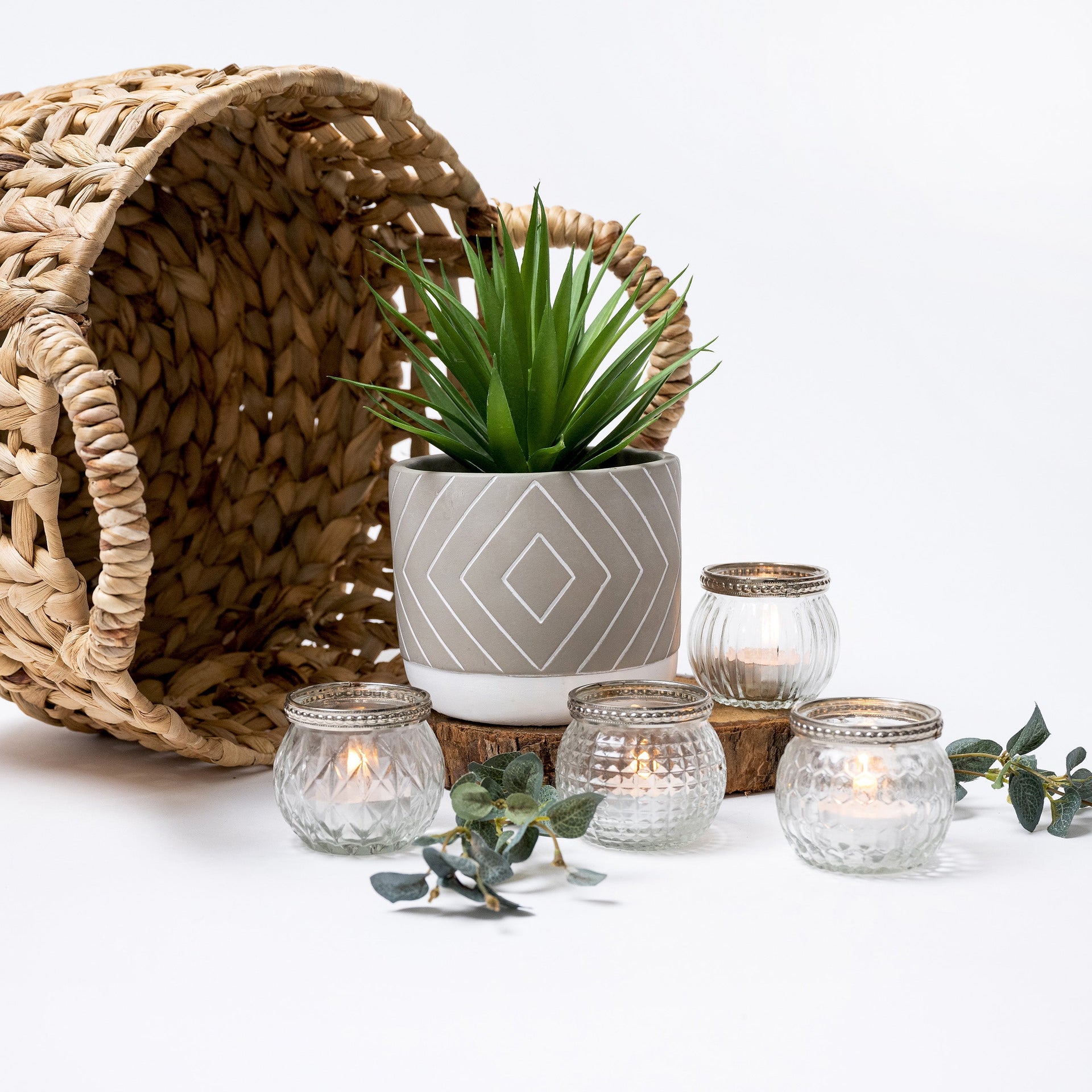 Artificial succulent plant in geometric patterned concrete pot 8