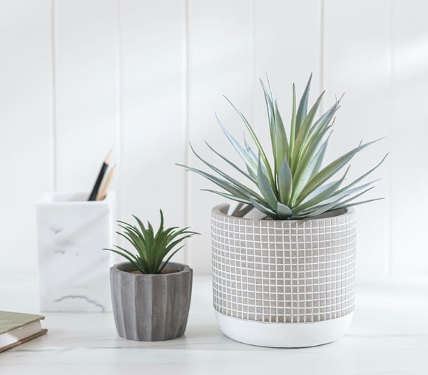 Artificial succulent plant in check patterned concrete pot 8