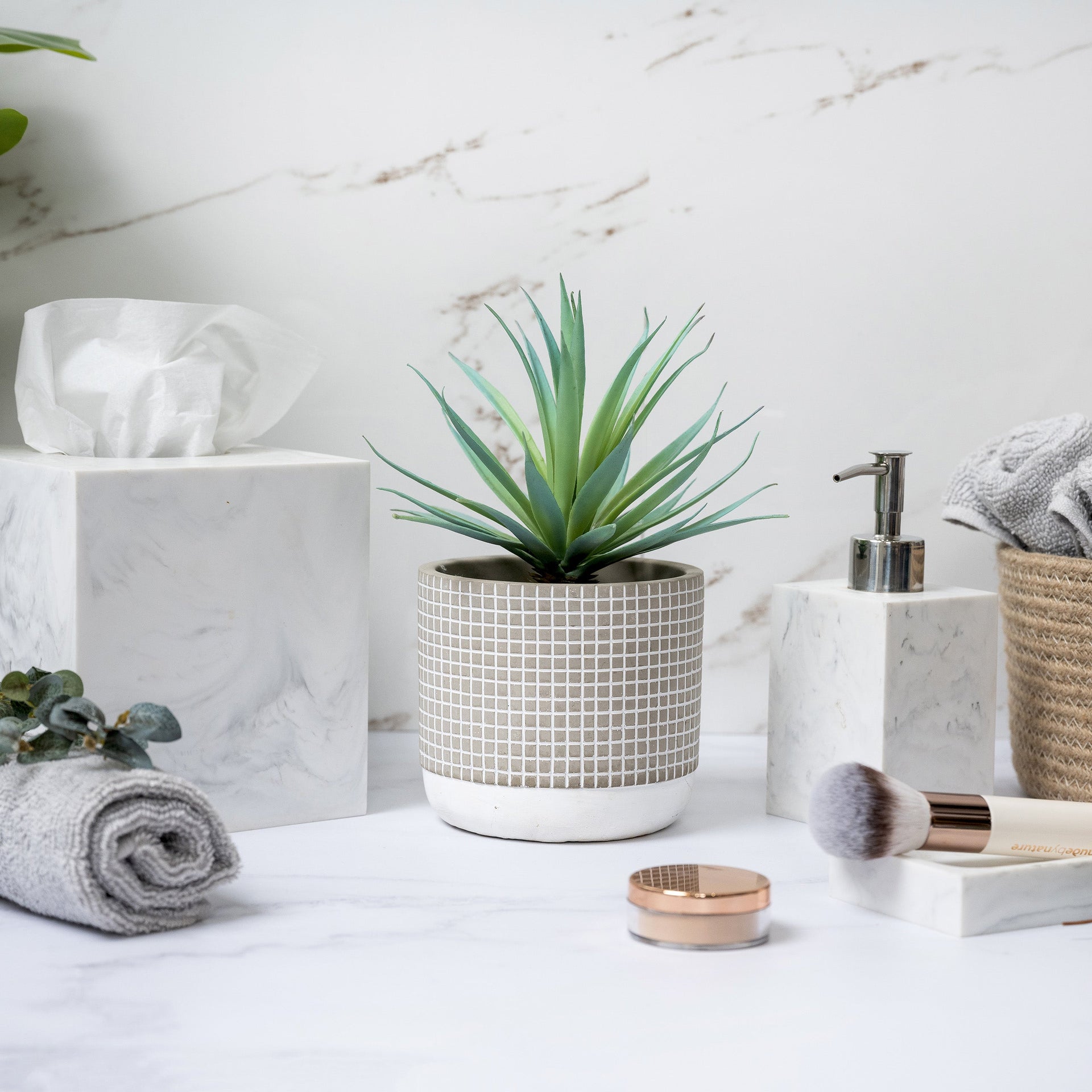 Artificial succulent plant in check patterned concrete pot 8