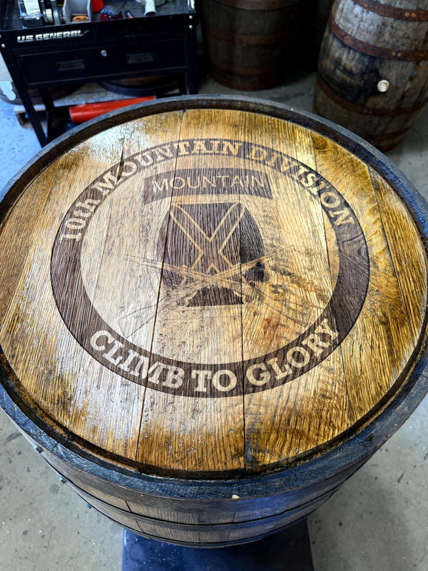 Motorized Pop Up Bourbon Barrel Cabinet.  Remote control & LED lighting.  Works with Alexa and Google Home. Custom engraving available.
