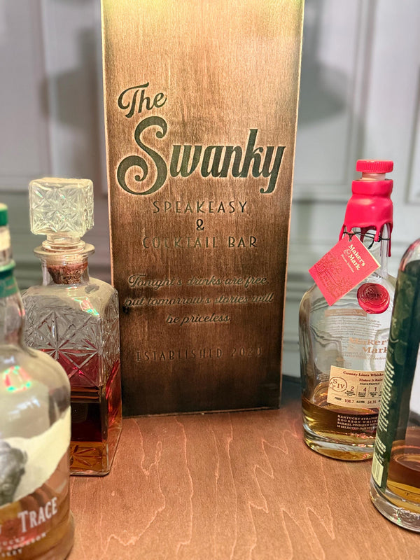 Motorized Pop Up Bourbon Barrel Cabinet.  Remote control & LED lighting.  Works with Alexa and Google Home. Custom engraving available.