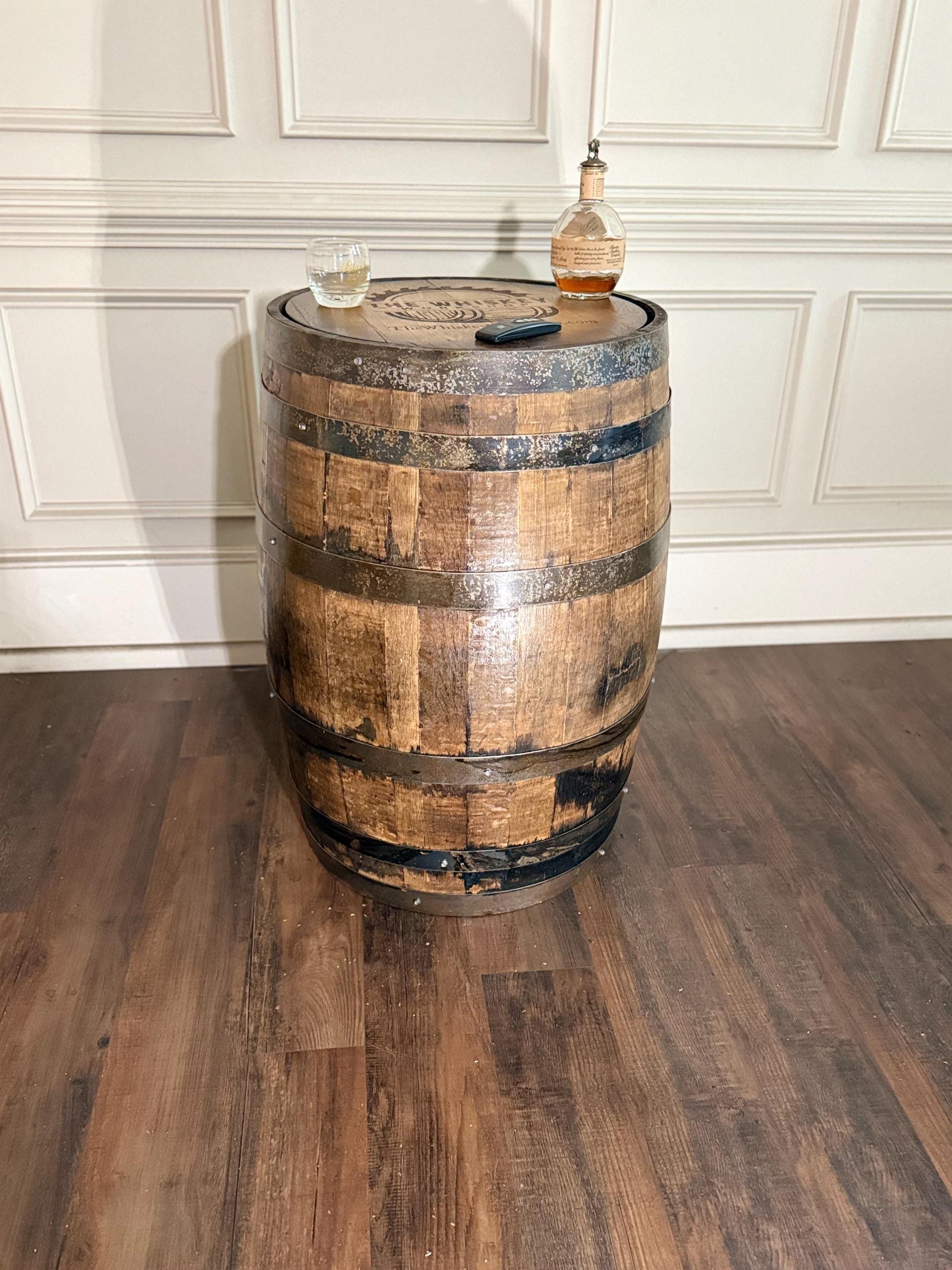 Motorized Pop Up Bourbon Barrel Cabinet.  Remote control & LED lighting.  Works with Alexa and Google Home. Custom engraving available.