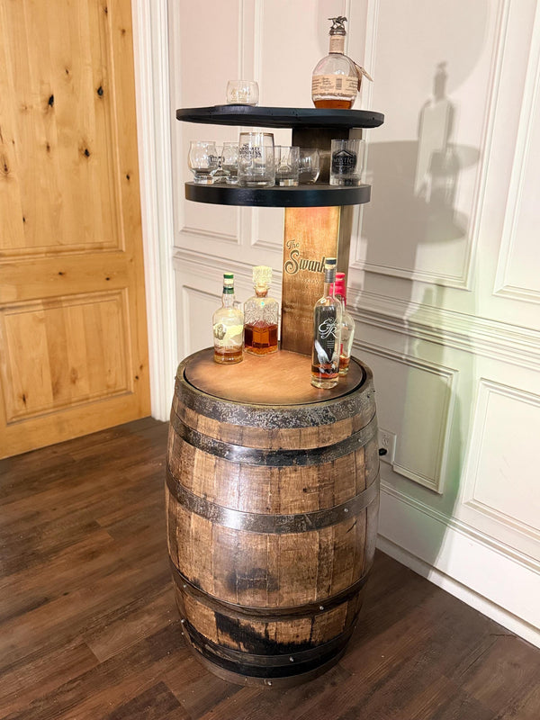 Motorized Pop Up Bourbon Barrel Cabinet.  Remote control & LED lighting.  Works with Alexa and Google Home. Custom engraving available.