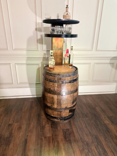 Motorized Pop Up Bourbon Barrel Cabinet.  Remote control & LED lighting.  Works with Alexa and Google Home. Custom engraving available.