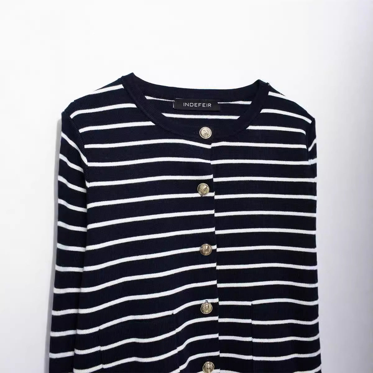 Knitted striped long sleeved suit for outerwear