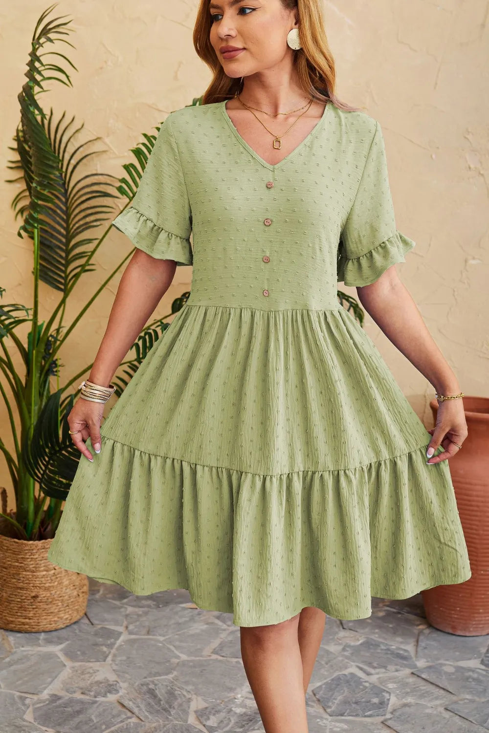 New V-neck jacquard waist cinched five quarter sleeve pleated dress