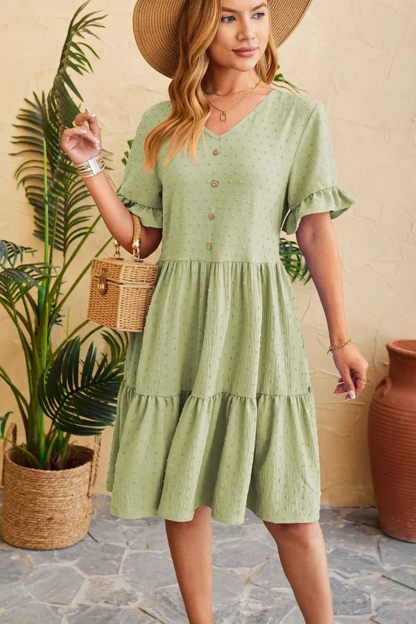 New V-neck jacquard waist cinched five quarter sleeve pleated dress