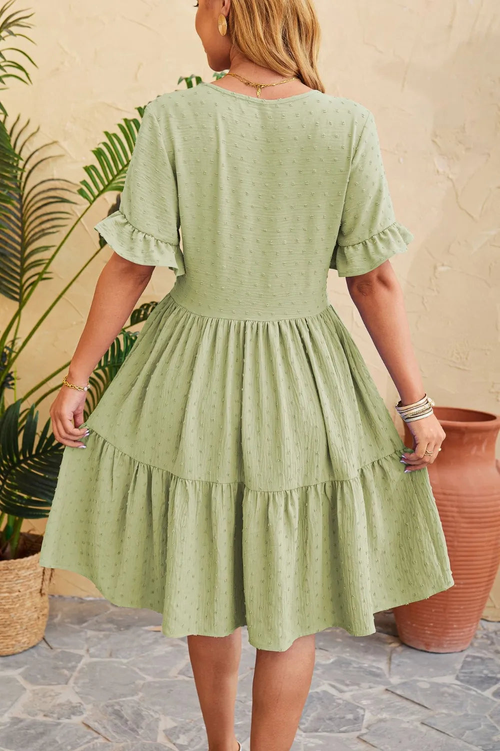 New V-neck jacquard waist cinched five quarter sleeve pleated dress