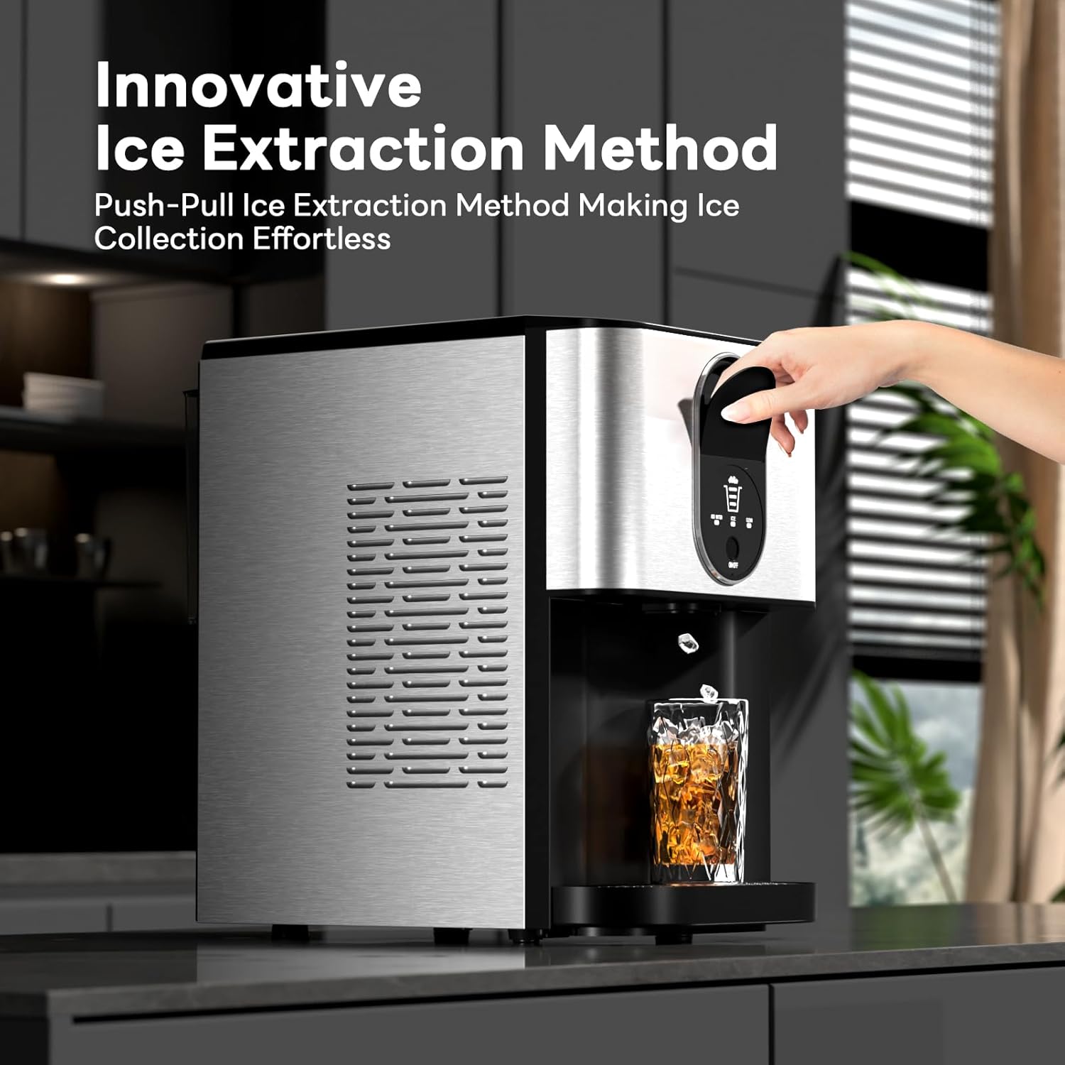 Ice maker with a glass of ice cubes on a kitchen counter, labeled 'Innovative Ice Extraction Method'.