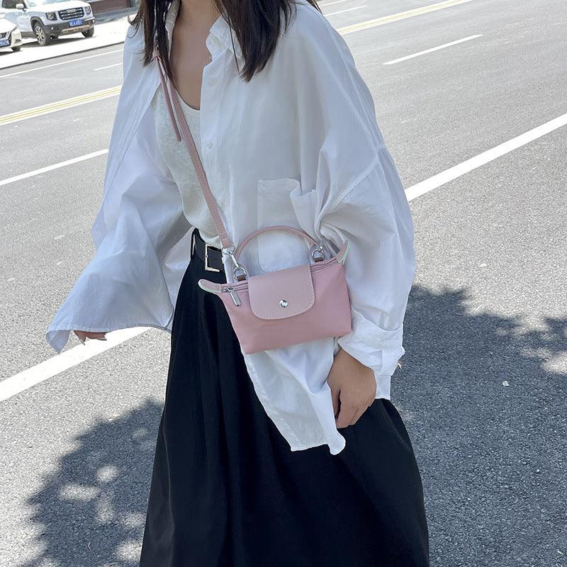 Retro fashion versatile women's bag, shoulder crossed, carrying high-end nylon dumpling bag