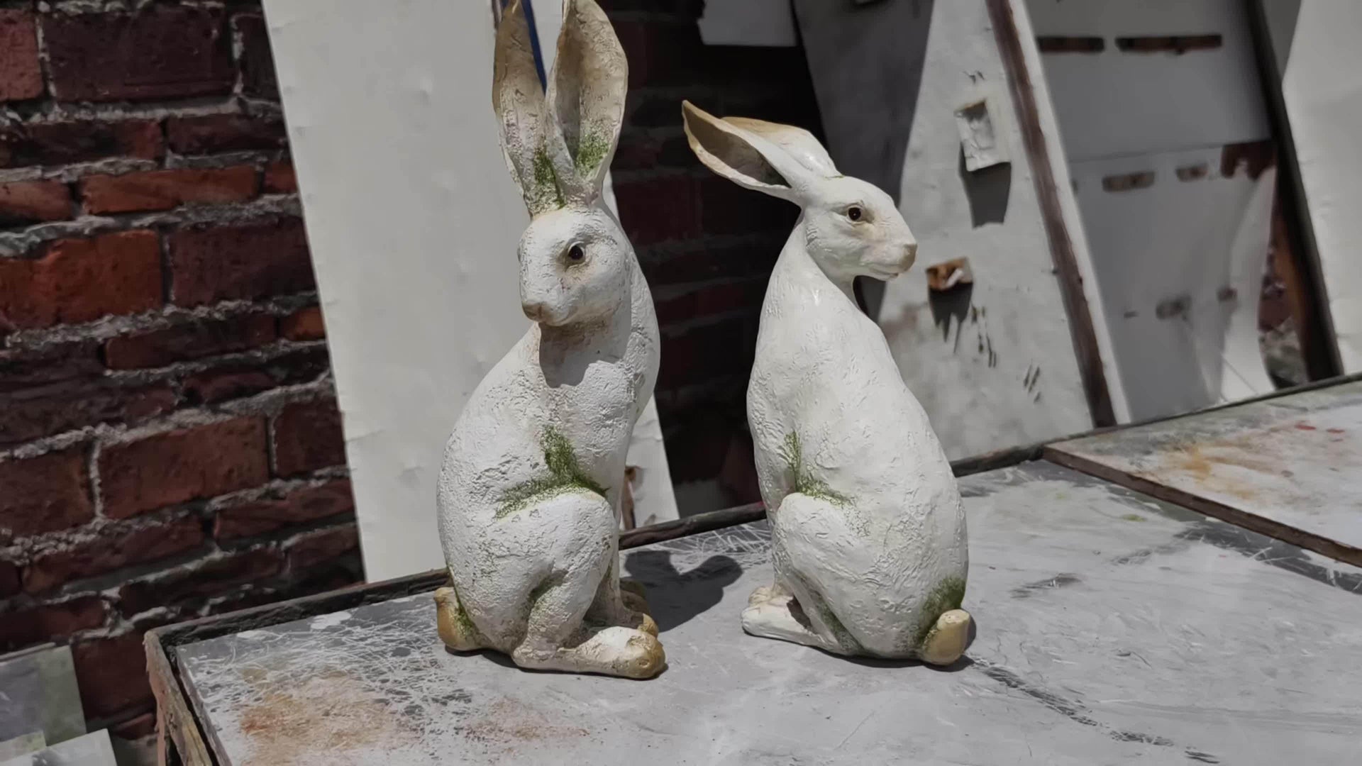 Set of 2 American-Style Long-Eared Rabbits with a Yellow And White Moss Design, Perfect for Spring And Summer. These Hand-Painted Resin Crafts Stand 12 Inches Tall And Make Great Decorative Gifts for Easter, Christmas, And Mo