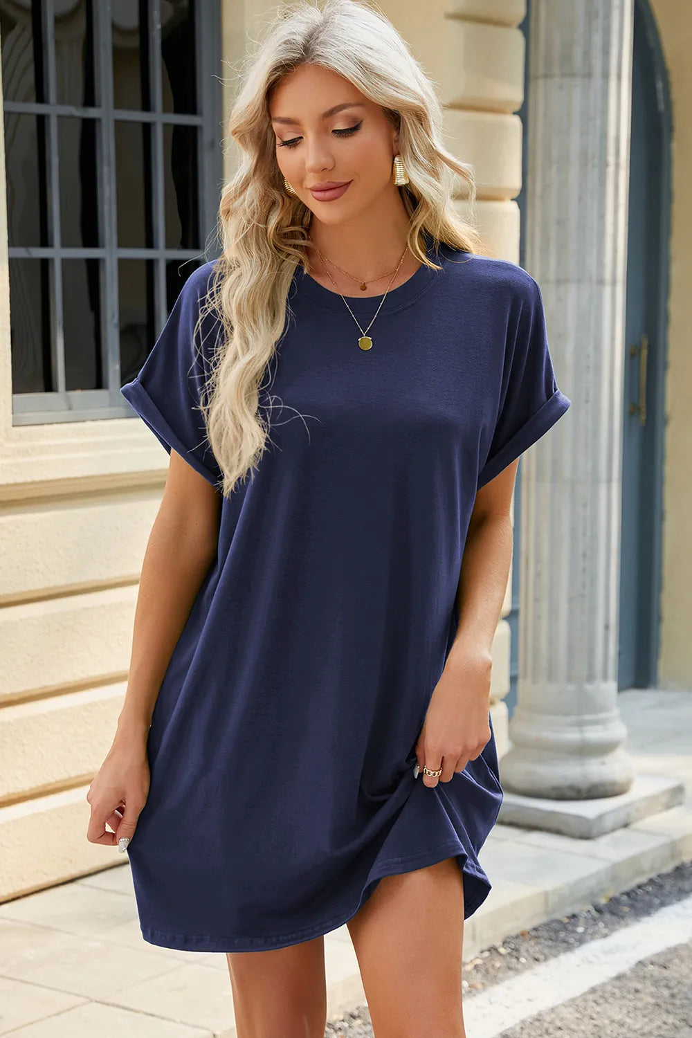 Solid color round neck pocket loose short sleeved dress