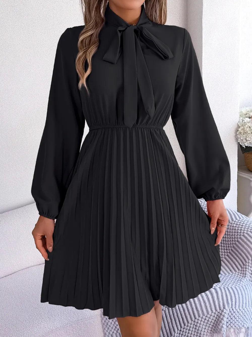 Spring and summer temperament tied waist long sleeved pleated skirt