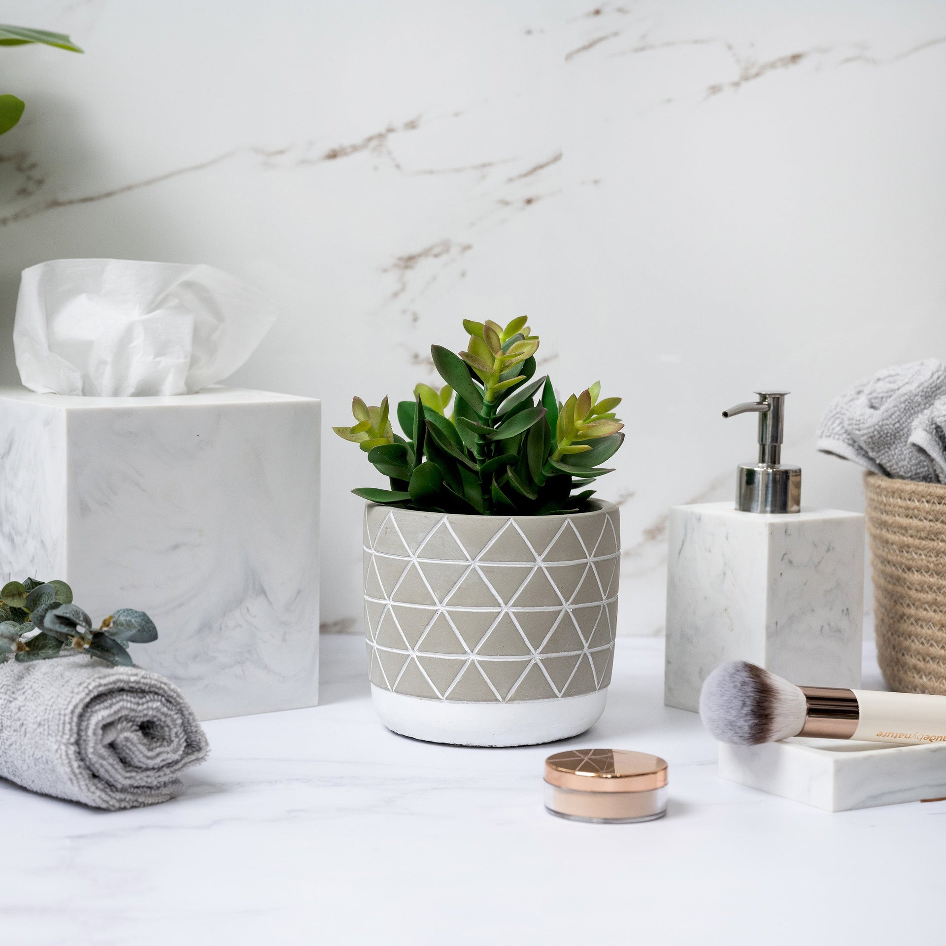 Artificial plant in diagonal patterned concrete pot  8