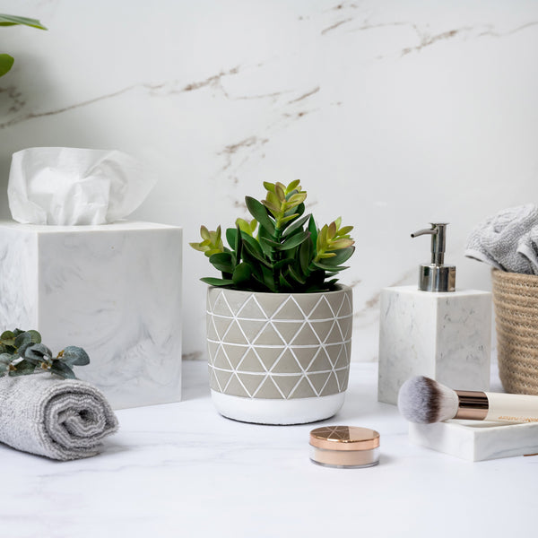 Artificial plant in diagonal patterned concrete pot  8