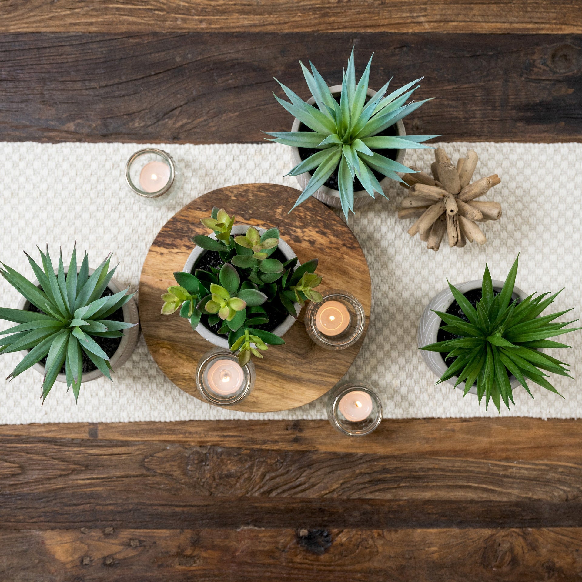 Artificial succulent plant in check patterned concrete pot 8