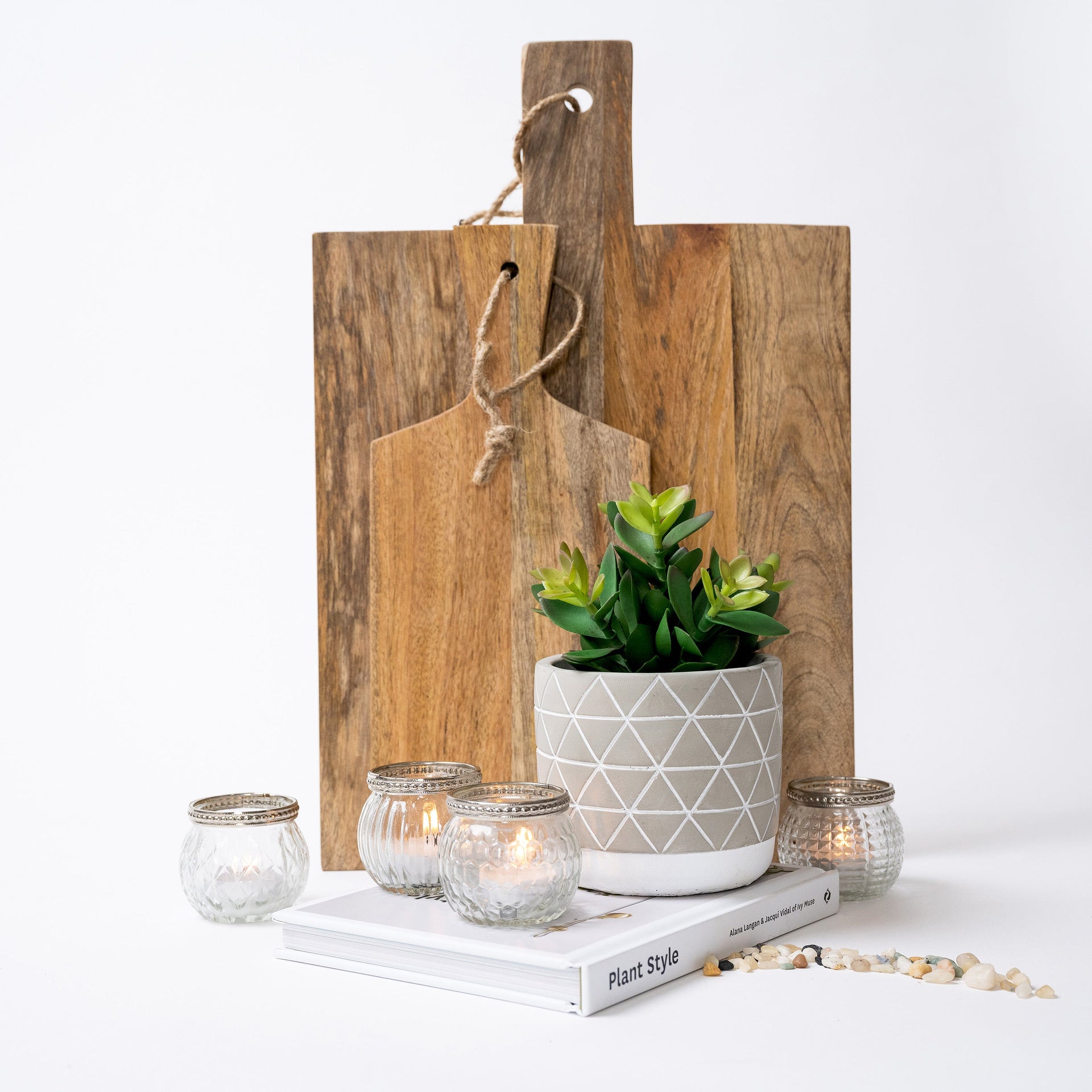 Artificial plant in diagonal patterned concrete pot  8