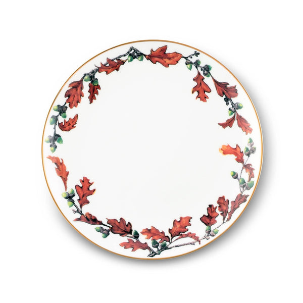 Decorative plate with autumn leaf design on a white background