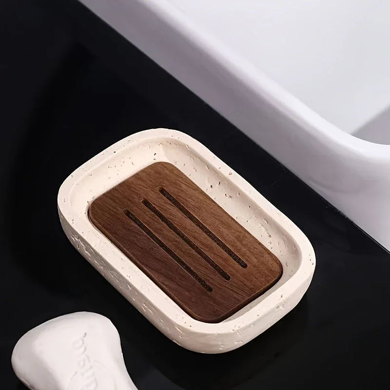 Wabi - sabi style sand - stone resin soap dish. The off - white sand - stone textured dish body is paired with a partition polished from imported North American walnut, presenting a simple and natural look. Sized approximatel
