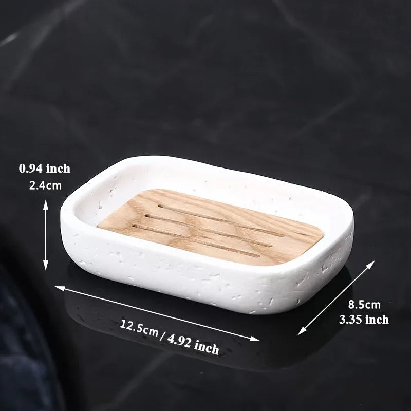 Wabi - sabi style sand - stone resin soap dish. The off - white sand - stone textured dish body is paired with a partition polished from imported North American walnut, presenting a simple and natural look. Sized approximatel