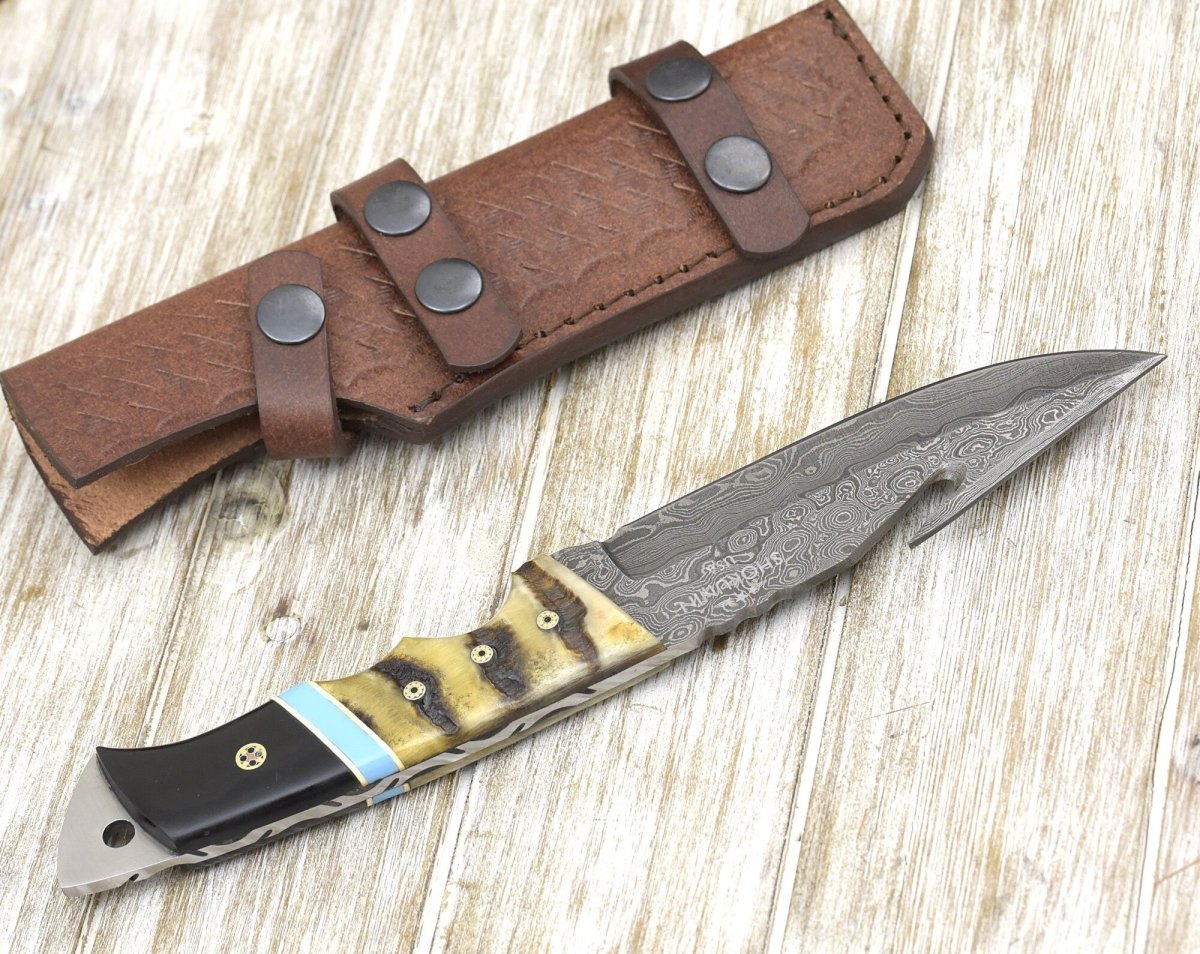 Wilderness Master Gut Hook Knife with Ram Horn and Turquoise Handle