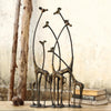 Towering Giraffe Herd Sculpture